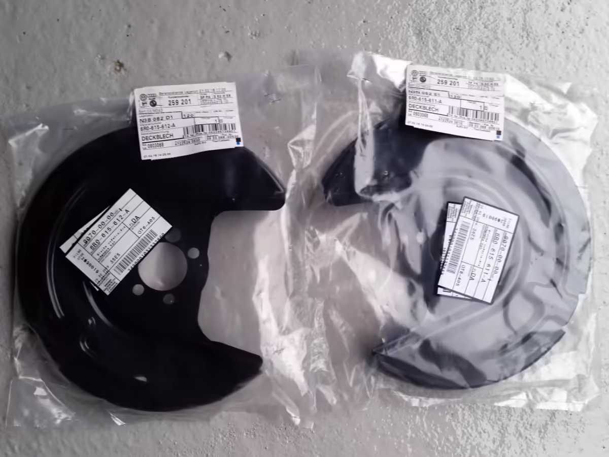 6R0615611A - Bremsscheibenabdeckung 256 mm; linke Seite [11/12]