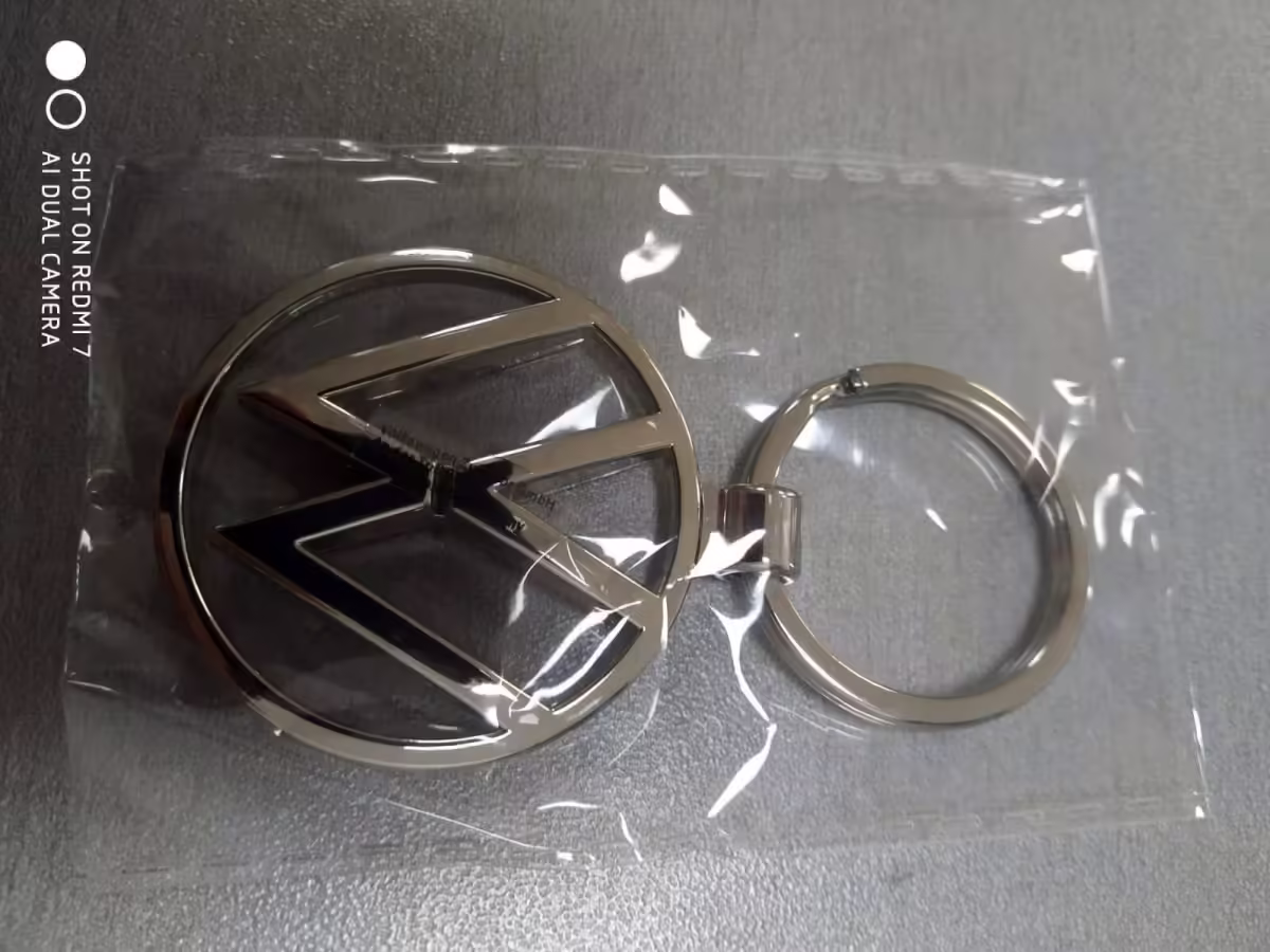 000087010BN - Brelok do kluczy nowe logo VW; metal, srebrny [12/15]
