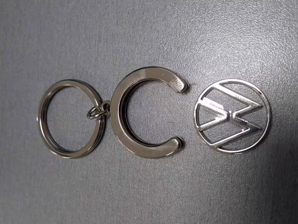 000087010BT - Brelok z żetonem; nowe logo VW [3/11]
