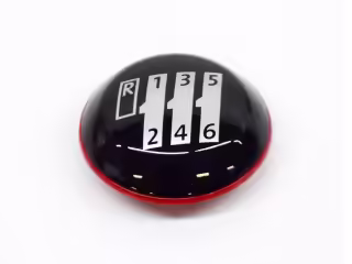 Gear shift lever badge