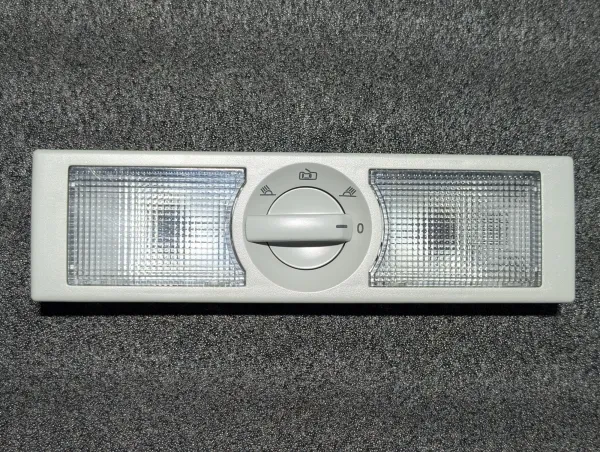 Interior and reading light with switch-off delay